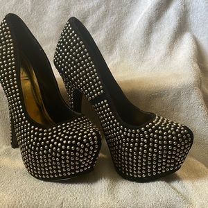 Posh, black platform heels with gold studs. Great for the upcoming holidays!!!
